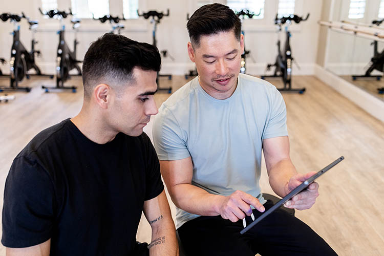 A photo of Aaron working with a client.